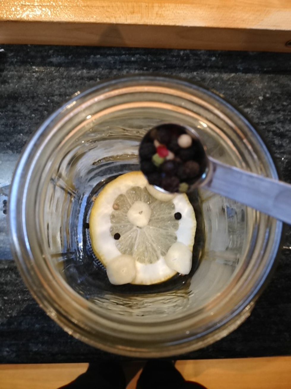 Add 1/4 teaspoon of peppercorns to each quart jar.
