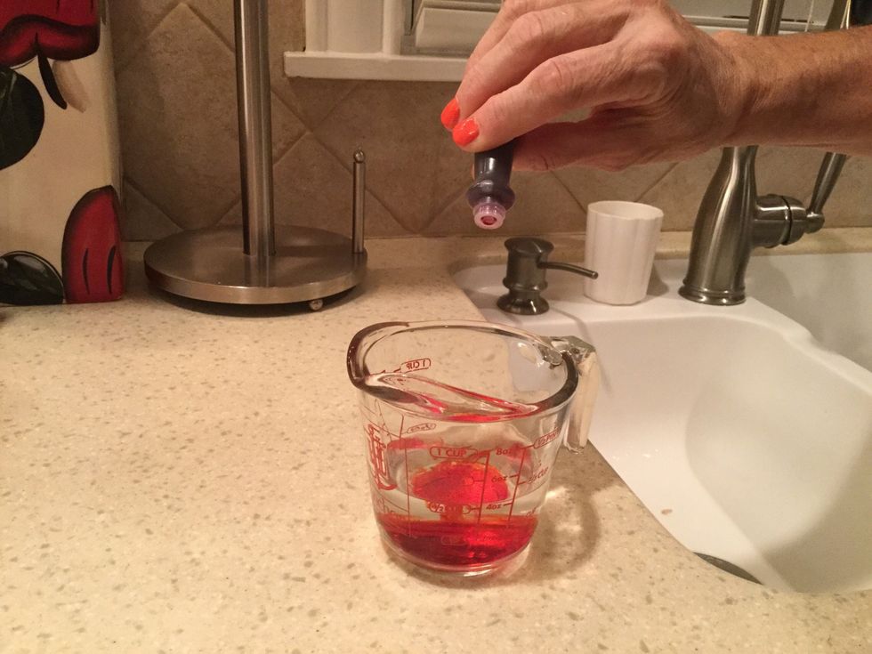 Add 1/4 teaspoons (or 3-4 drops) of any food coloring of your choice to the 1/2 cup of warm water.