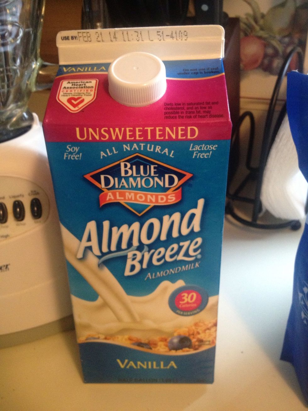 Add 1.5 - 2 cups of liquid to your blender. I use unsweetened vanilla almond milk but water or milk is okay too.