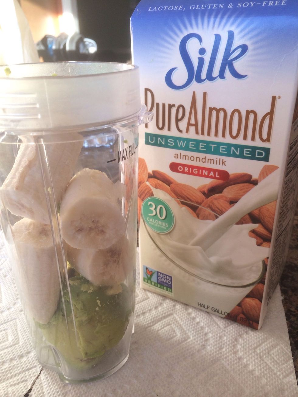 Add 1.5 cups of unsweetened almond milk or add to adjust consistency of smoothie.