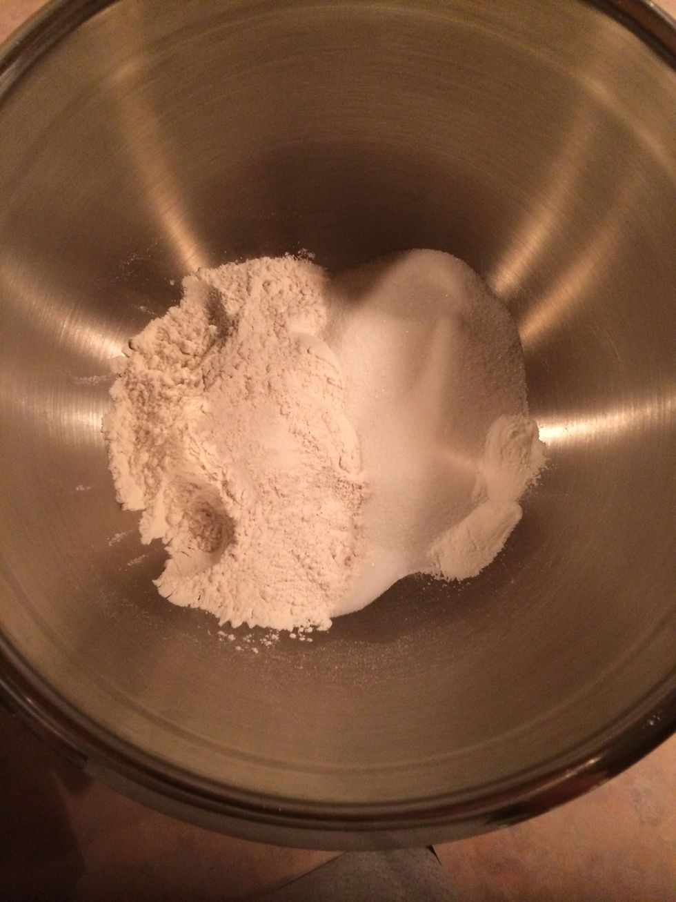 Add 1 and 1/2 cup flour, 3/4 cup sugar, 1/2 tsp salt, and 2tsp baking powder to bowl