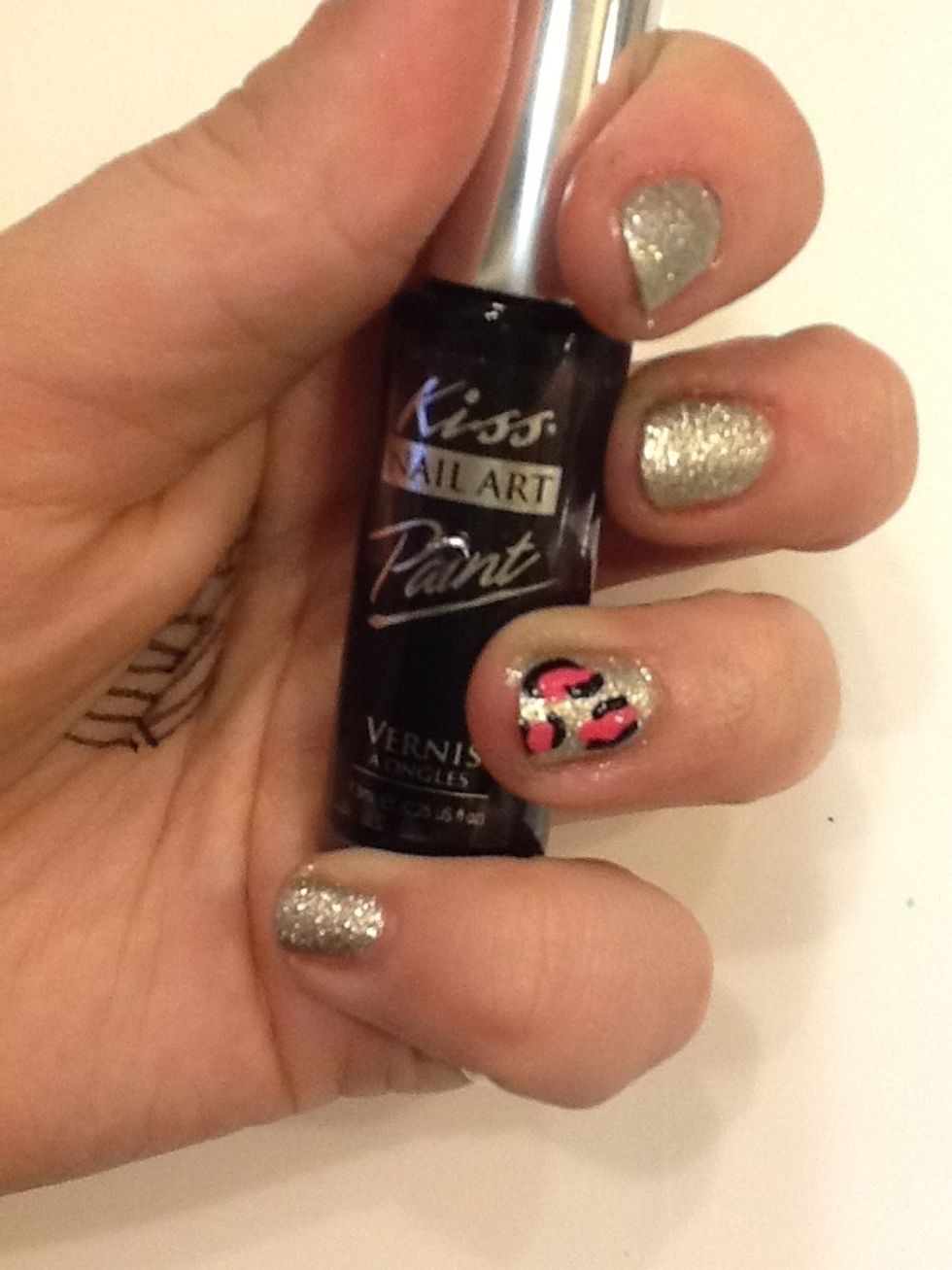 Add 1 big c and 1 little c around opposite sides of the spots with a black striper