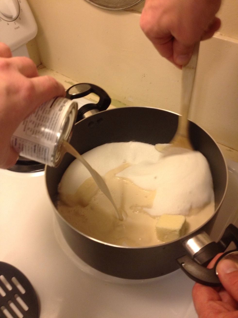 Add 1 can (12 oz) evaporated milk. Bring to boil over med heat, turn down simmer for six minutes, stirring occasionally