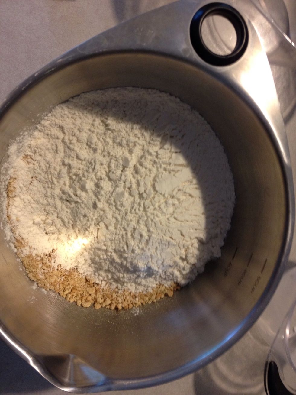 Add 1 cup flour and 1/2 cup sugar and mix together.