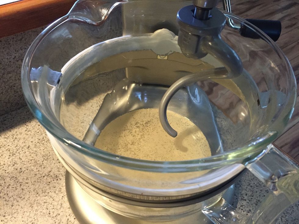 Add 1 cup of 110 degree water to your bowl, dissolve the 1 teaspoon sugar. Add the yeast and let it sit until it starts foaming.