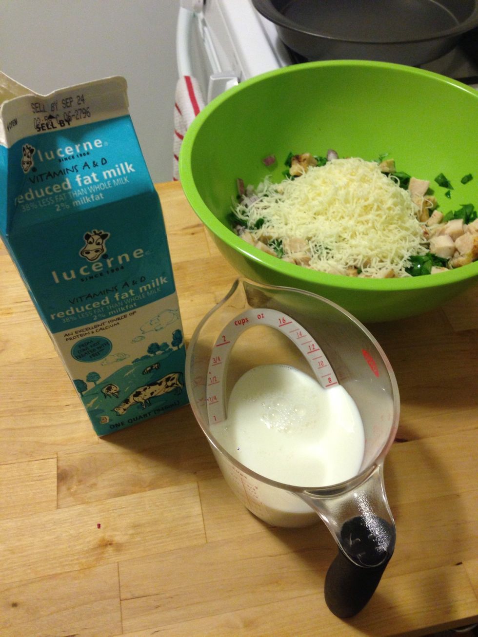 Add 1 cup of cheese and 1 cup of milk to the mixture. I used Italian blend cheese.