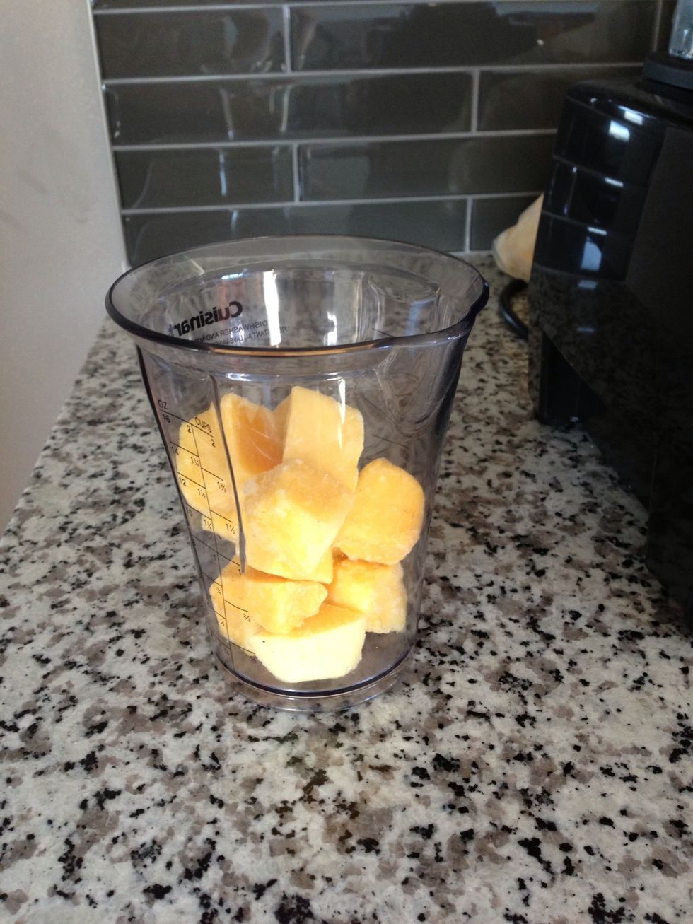 Add 1 cup of frozen mangos, 3/4 cup of blueberries, 3/4 cup of raspberries, Kiefer and 1 1/2 cup of  water to blender