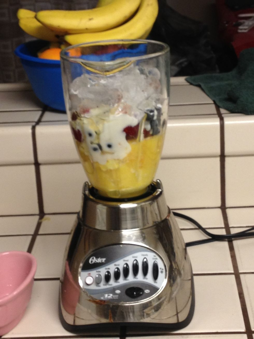 Add 1 cup of ice and one cup of orange juice