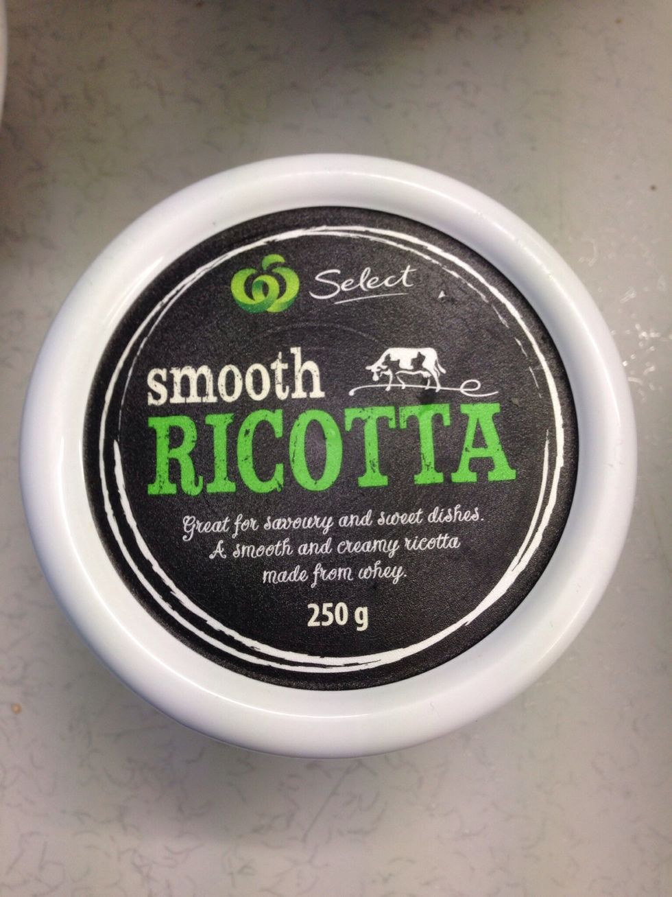 Add 1 cup of ricotta to the Parmesan cheese