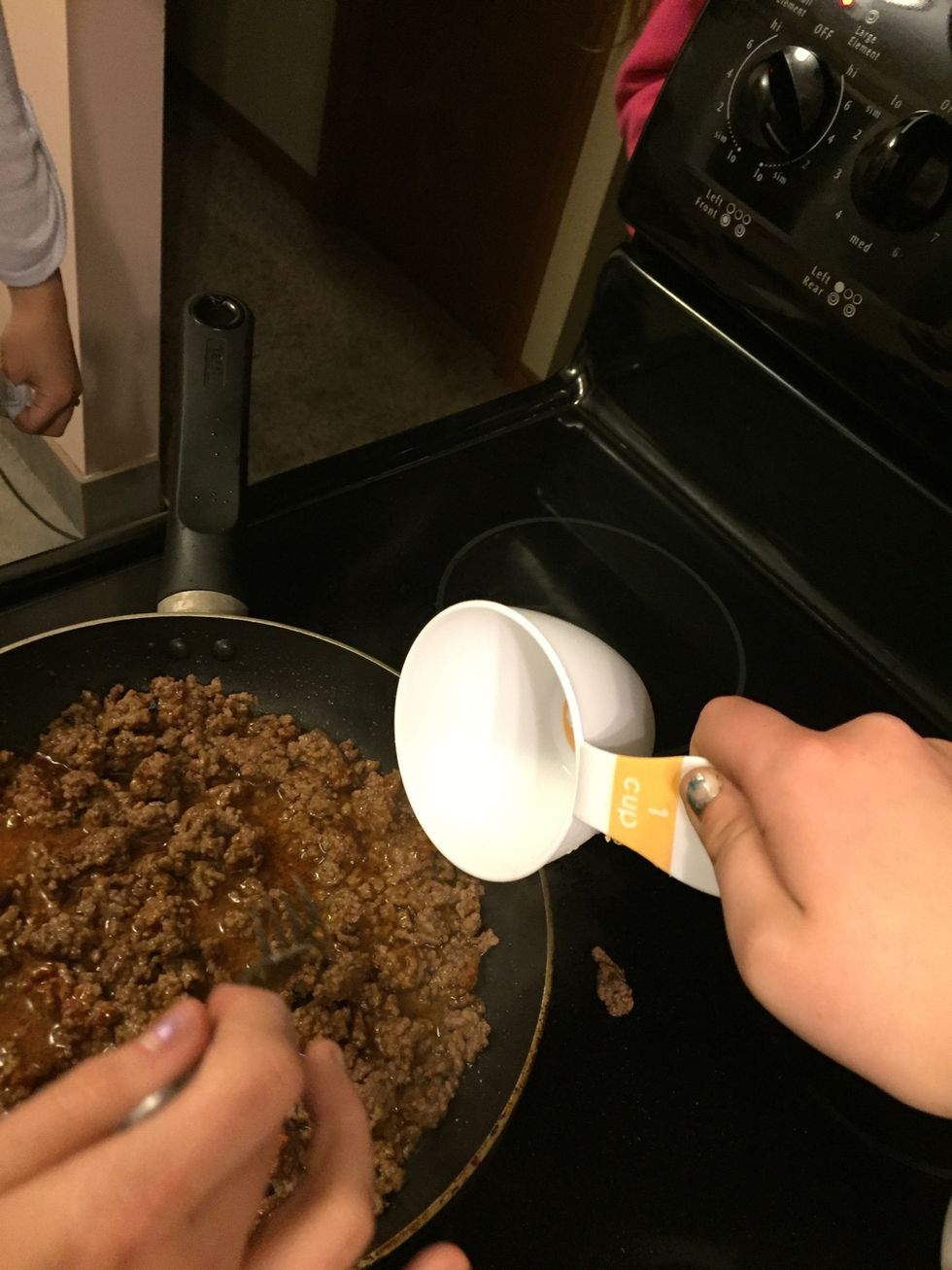 Add 1 cup of water to the pan.