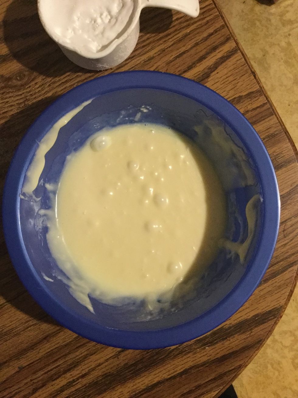 Add 1 cup of white marshmallows and 1/2 a can of sweetened condensed milk, then put it in the microwave at 20 second increments until melted.