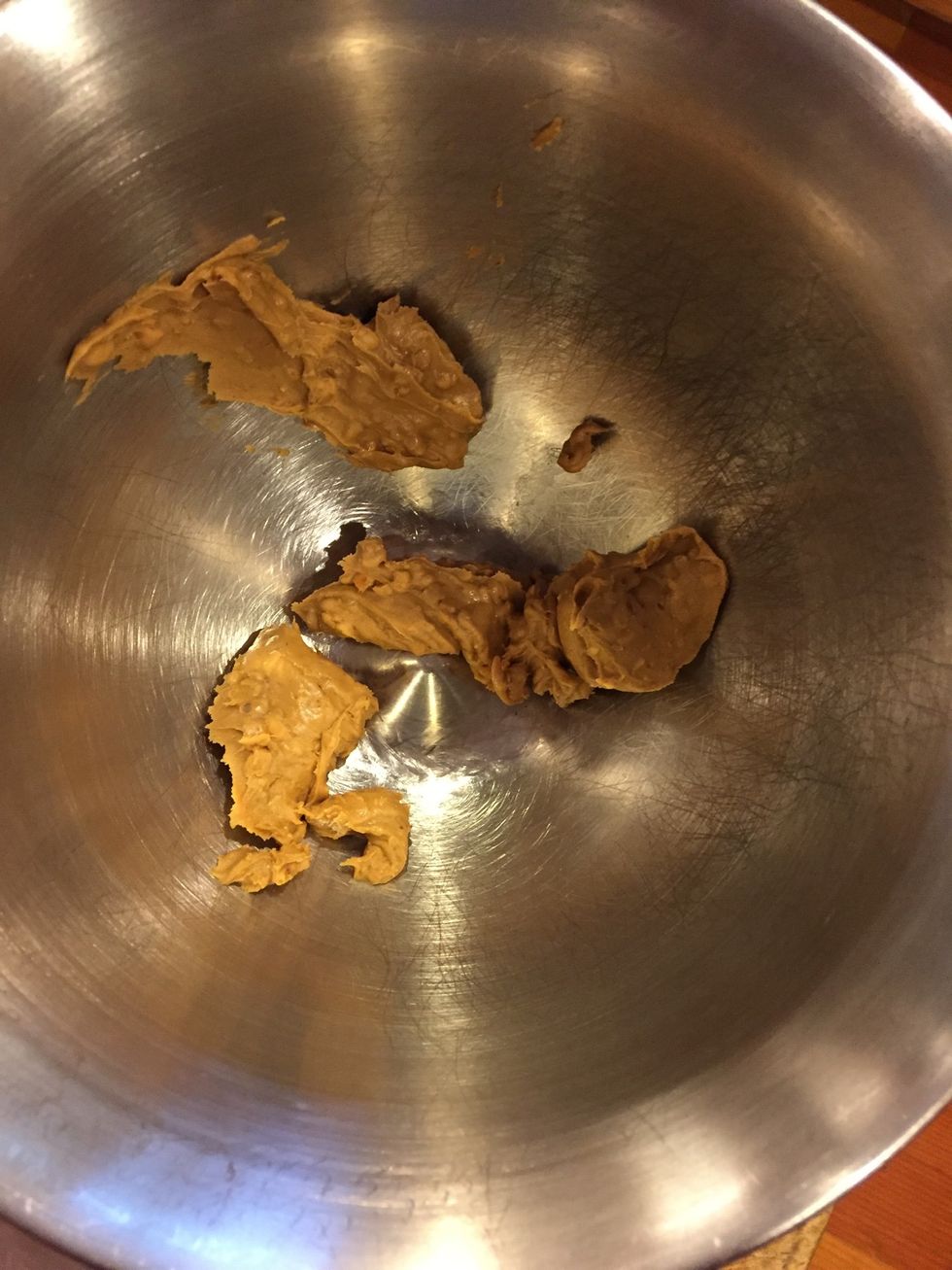 Add 1 cup peanut butter to your mixing bowl..