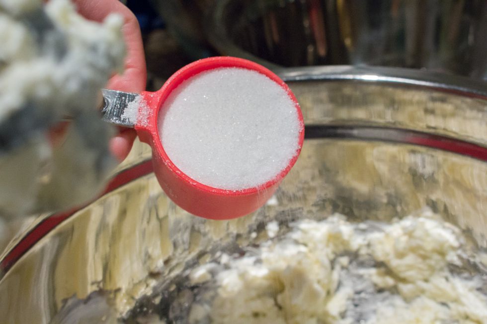 Add 1 cup white granulated sugar to butter/shortening mixture.