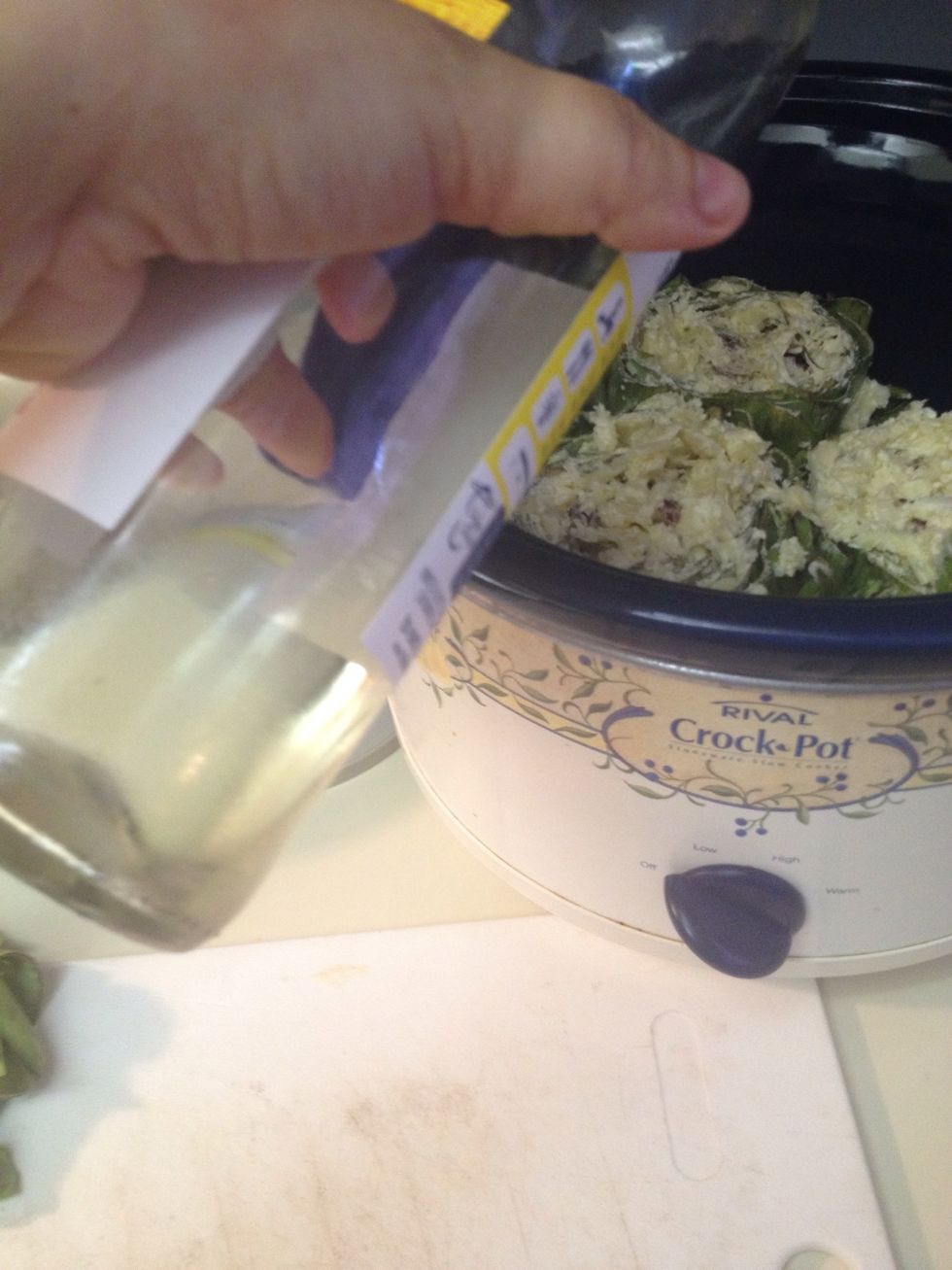 Add 1 cup white wine to the basin.