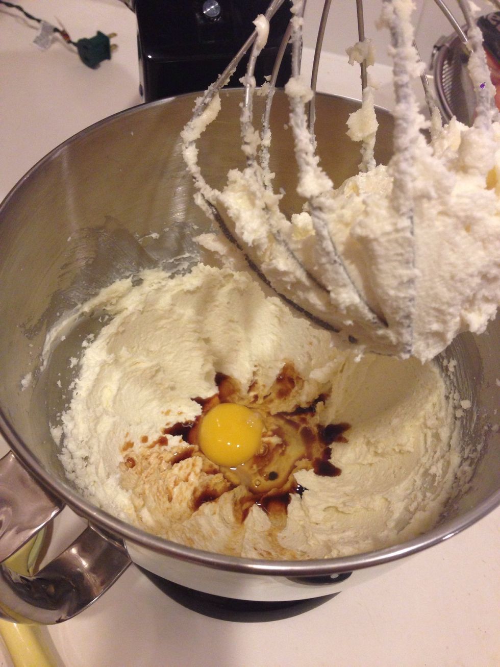 Add 1 egg & 1 teaspoon vanilla extract and mix.