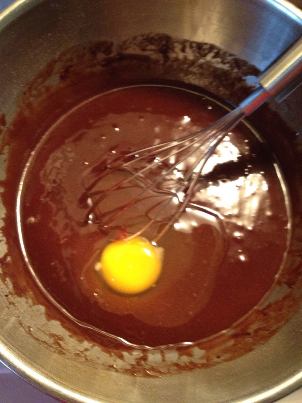 Add 1 egg after mixing well.