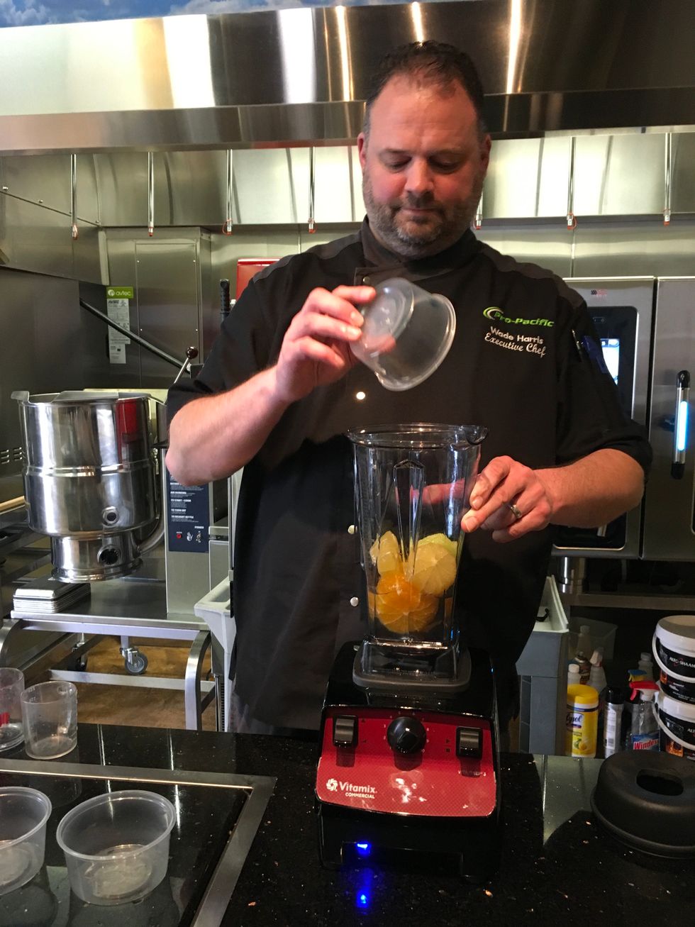 Add 1 Lemon (peeled and halved) to the container.