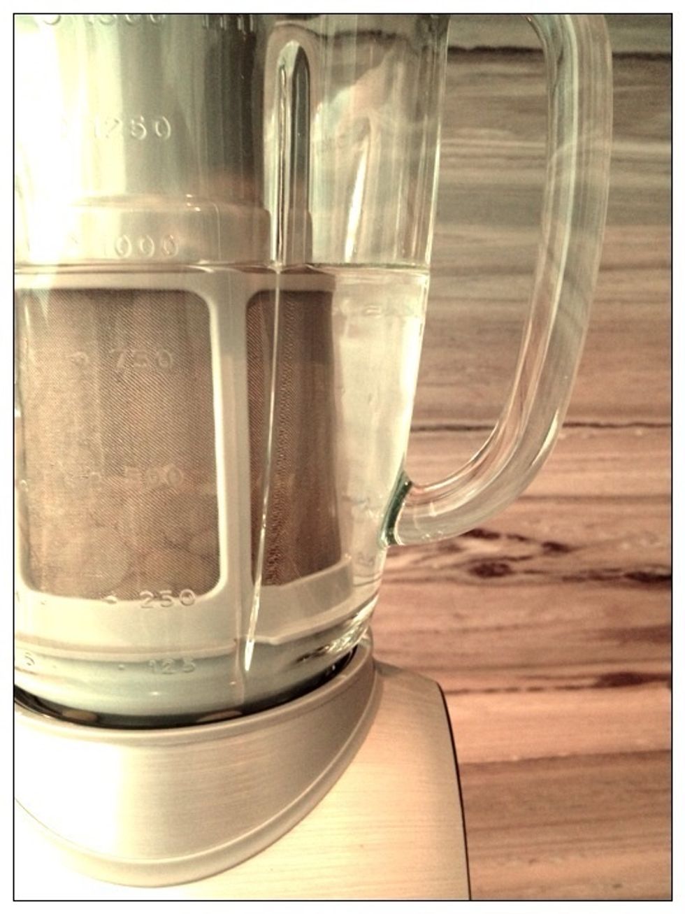 Add 1 liter of distilled water to the blender