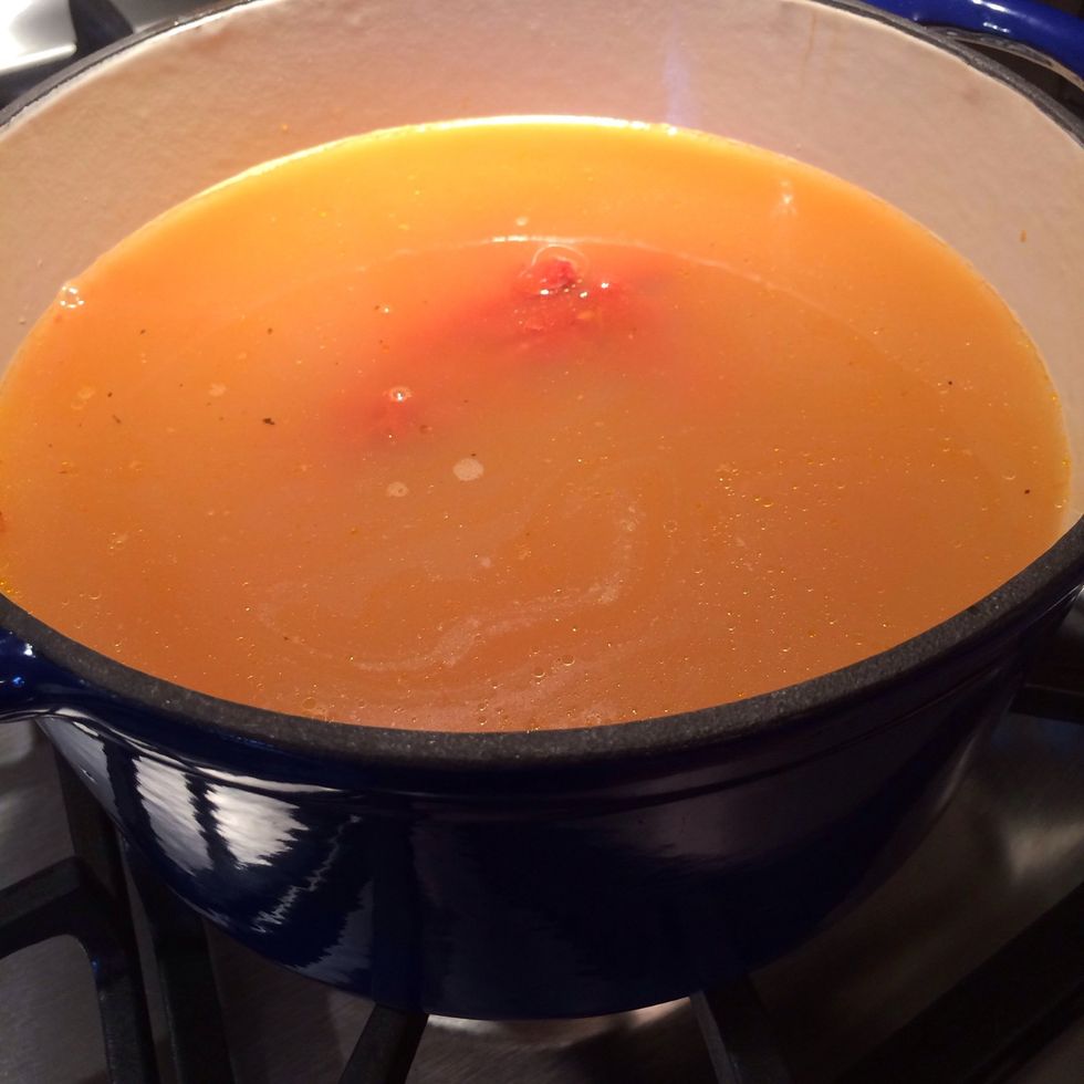 Add 1 quart chicken stock to the pot.