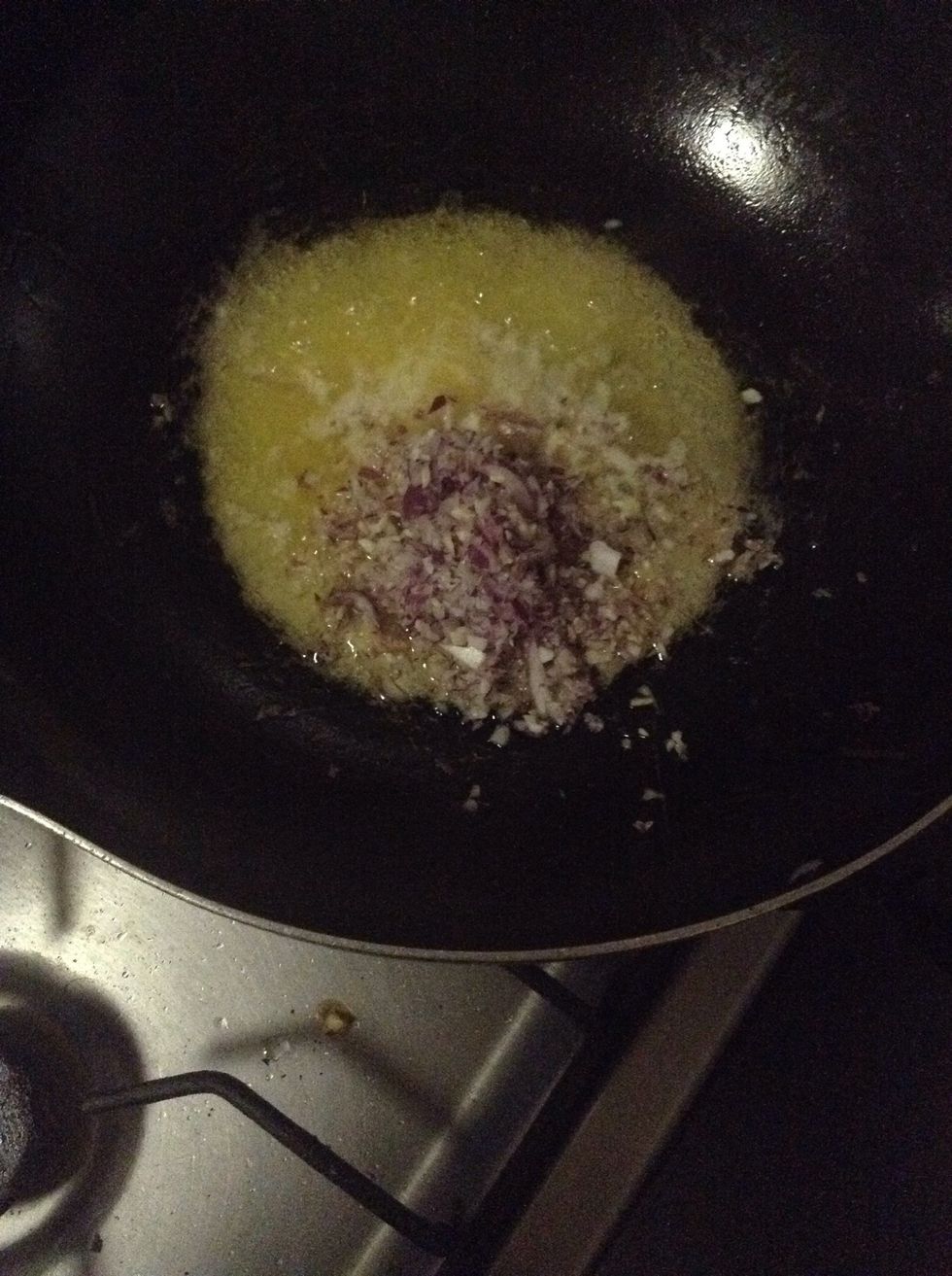 Add 1 small onion chopped finely, and 2 medium cloves of garlic