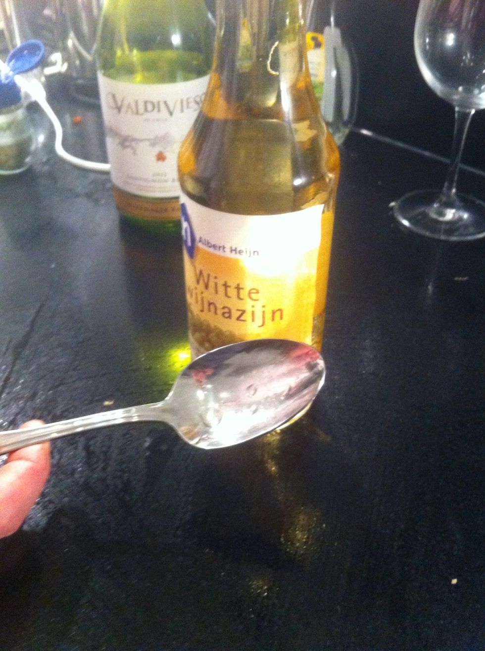 Add 1 spoon of white wine per egg in the frying pan with the eggs and butter.