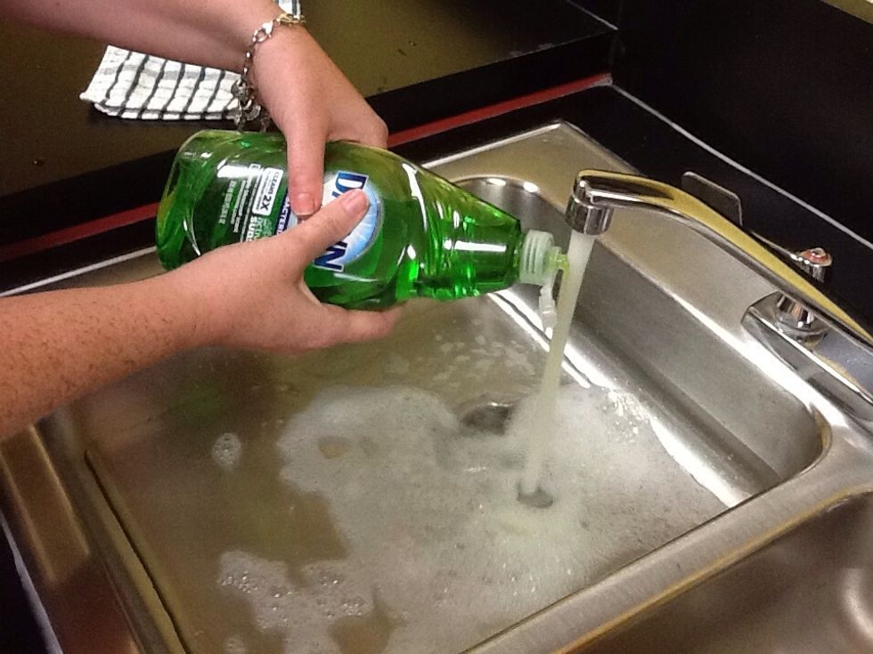 Add 1 squeeze of soap directly to the running water stream.