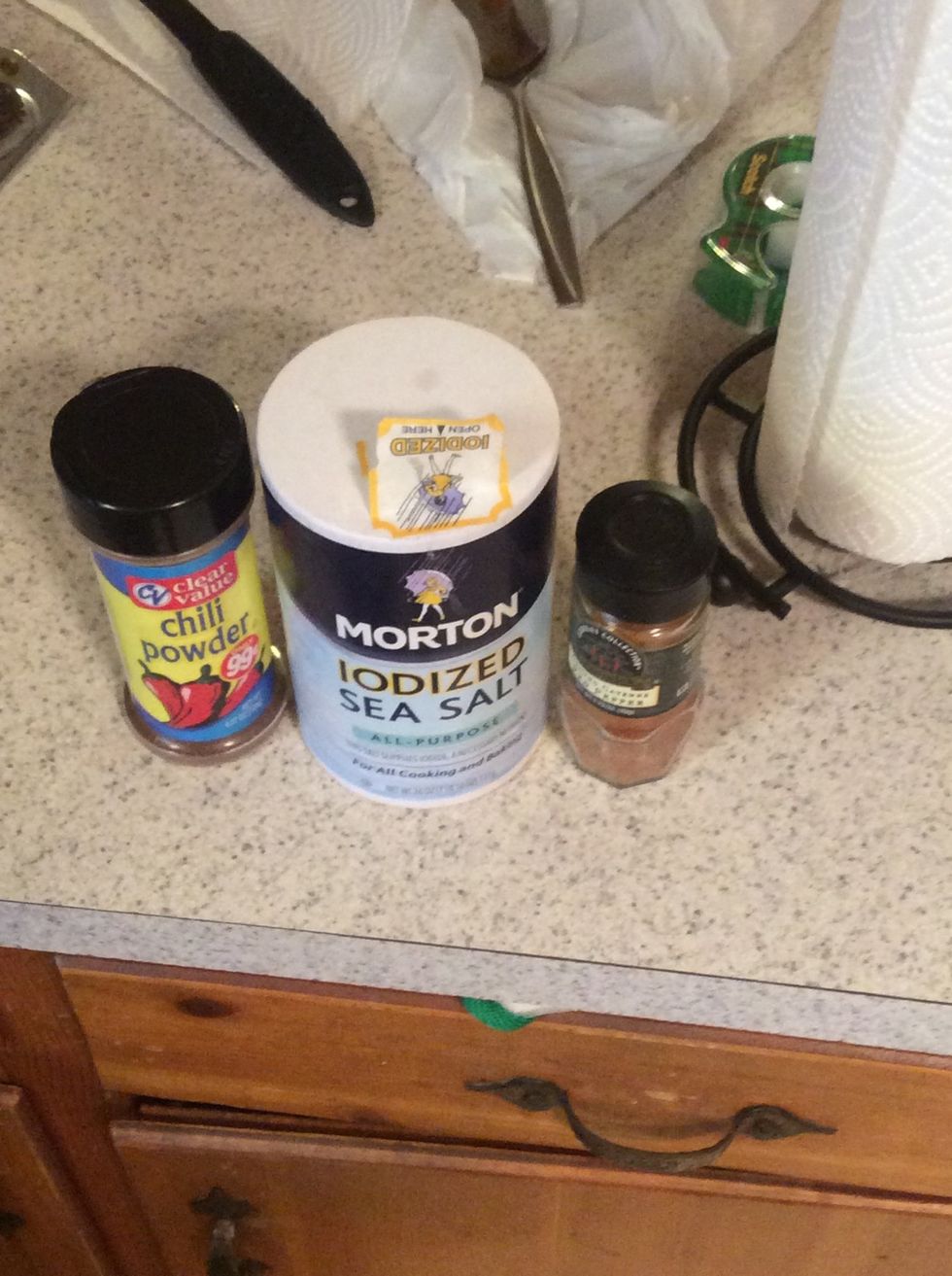 Add 1 tablespoon of chili power, 1/2 a teaspoon of salt, and 1/2 a teaspoon of cayenne pepper