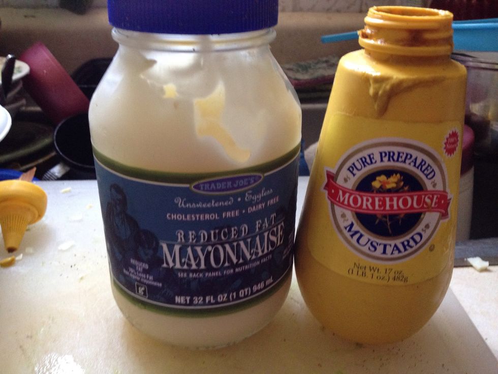 Add 1 tablespoon of mustard and 2 of tablespoons of mayo to eggs.