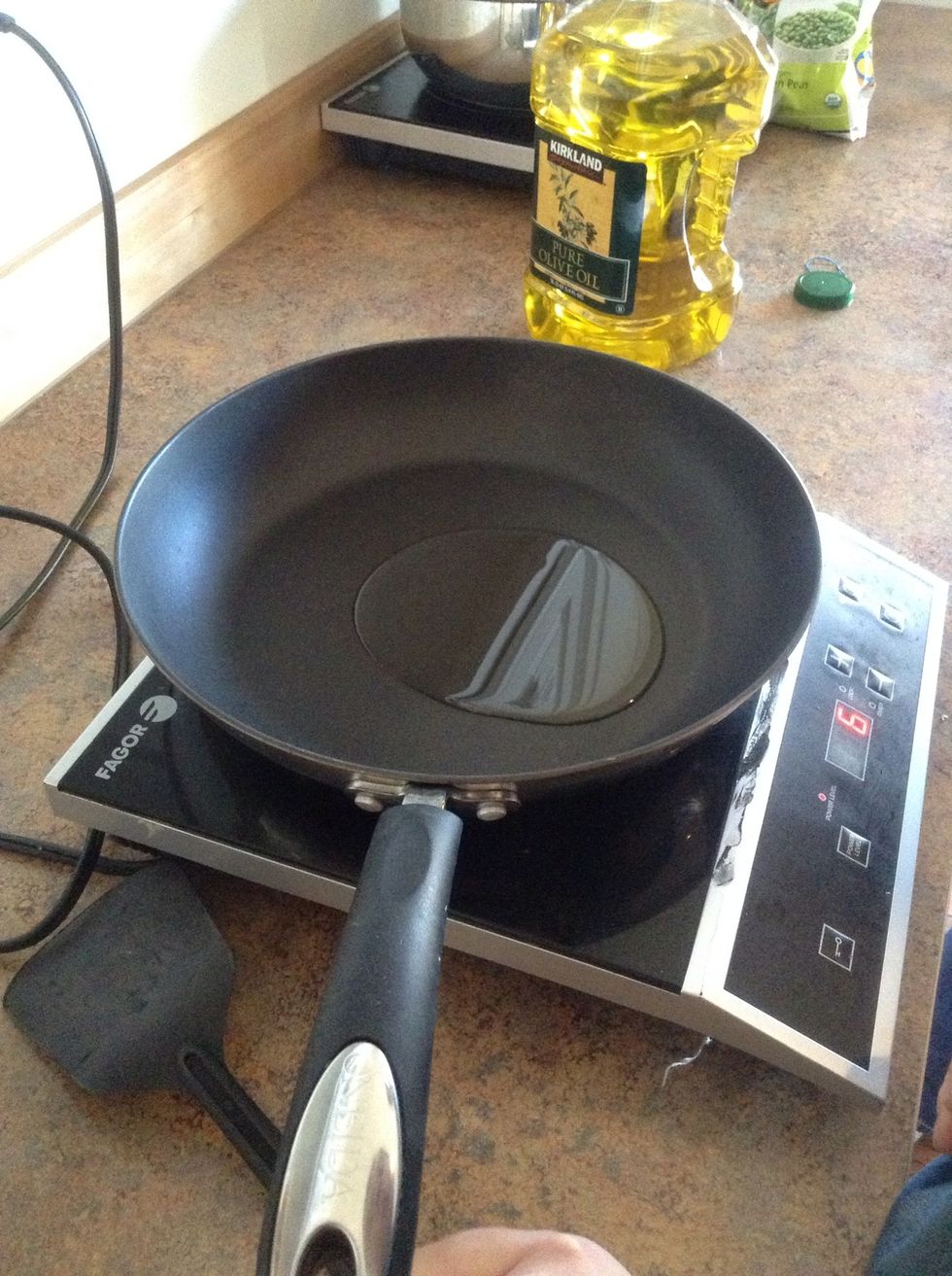 Add 1 tablespoon of olive oil to pan