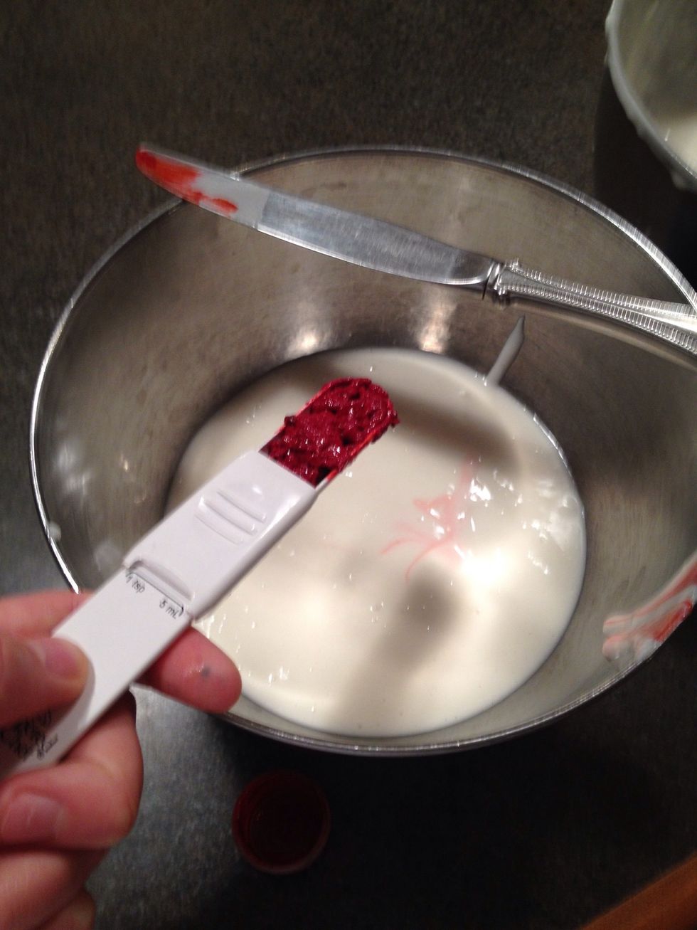 Add 1 tablespoon of red food coloring.