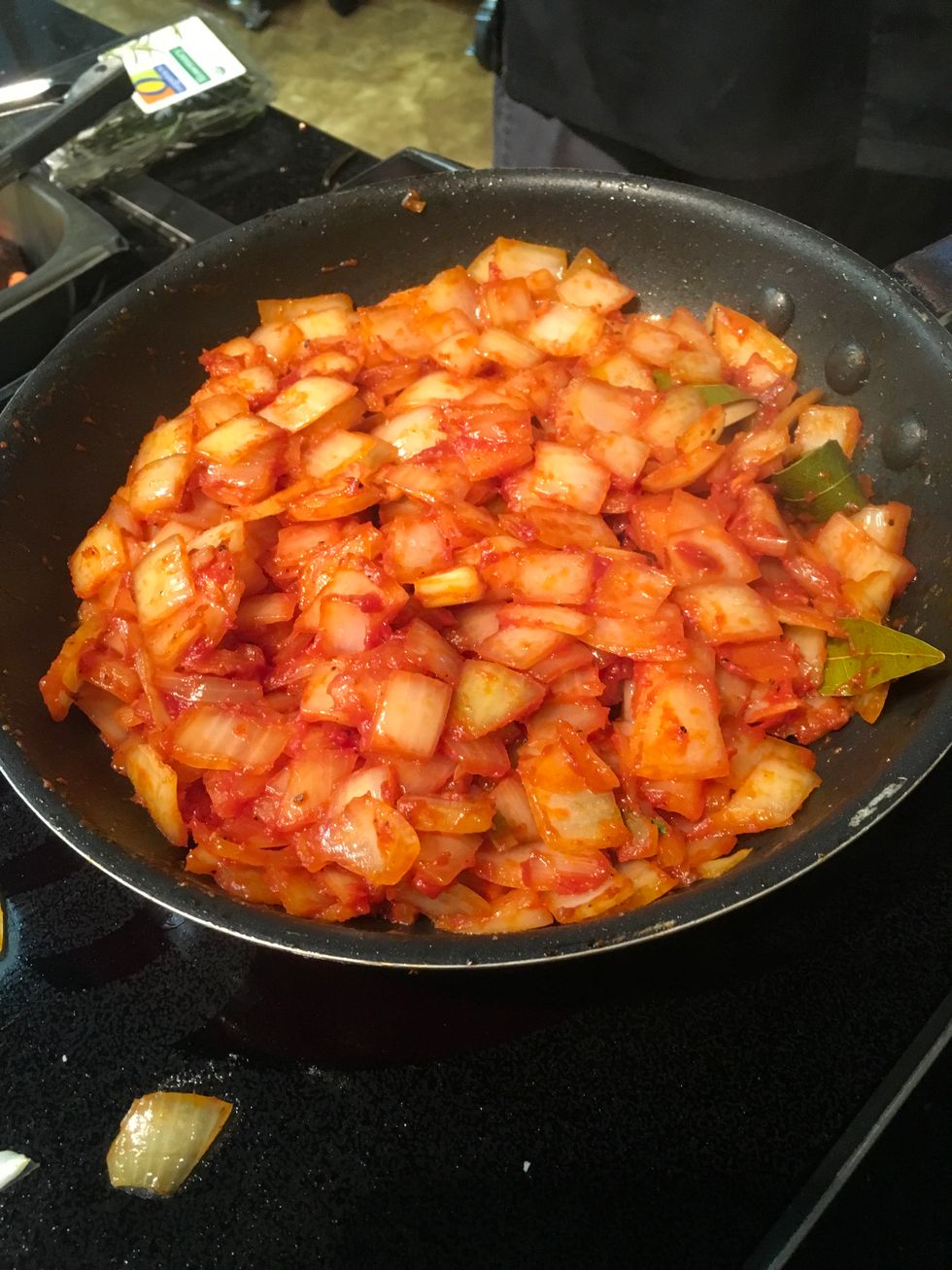 Add 1 tablespoon of Tomato Paste and cook until onion mixture is fully coated.