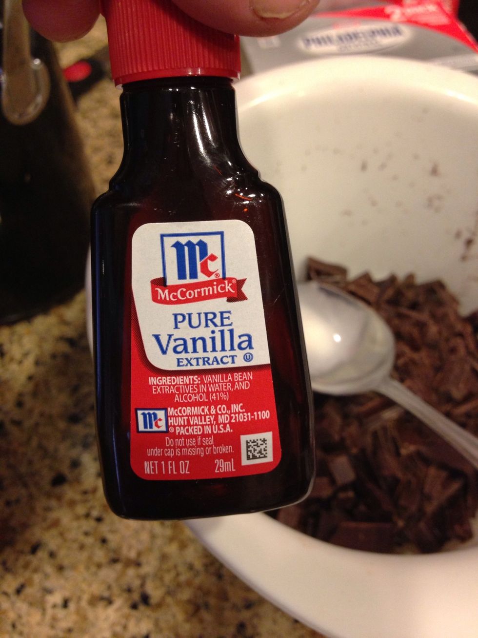 Add 1 tablespoon of Vanilla Extract to chopped chocolate.