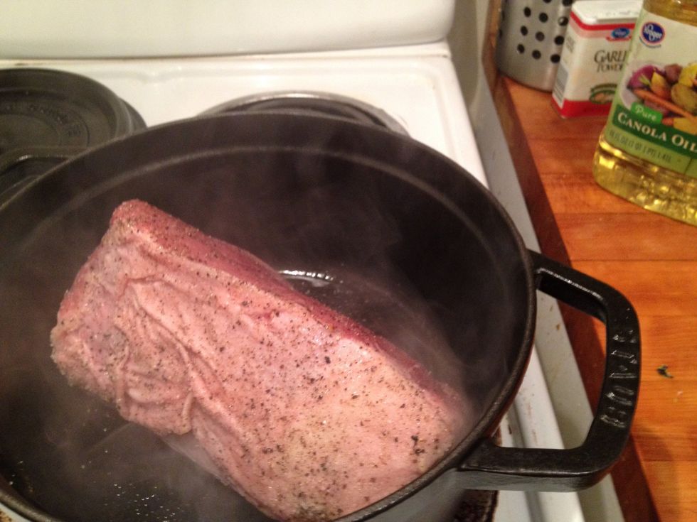 Add 1 Tbsp canola oil to a cast iron Dutch oven (if you have one) on medium high and sear the roast on all sides to a nice golden brown.