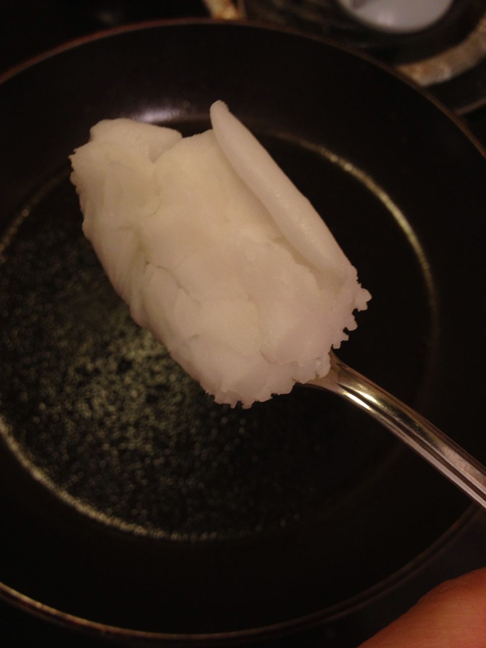 Add 1 tbsp coconut oil to your nonstick pan on medium high heat. You can use olive oil or butter but coconut oil is much better for you and has a nice flavor.