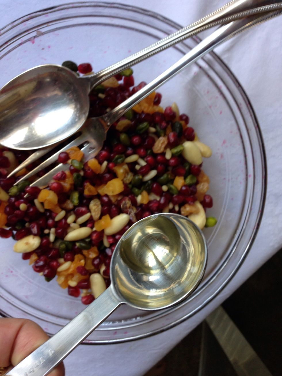 Add 1 TBsp of orange flower water and 1 TBsp of rose water mix and transfer to the serving dish