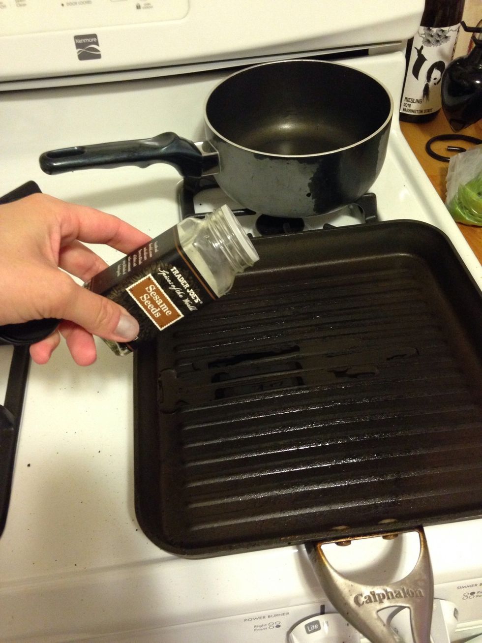 Add 1 tbsp of sesame seeds to the oil.