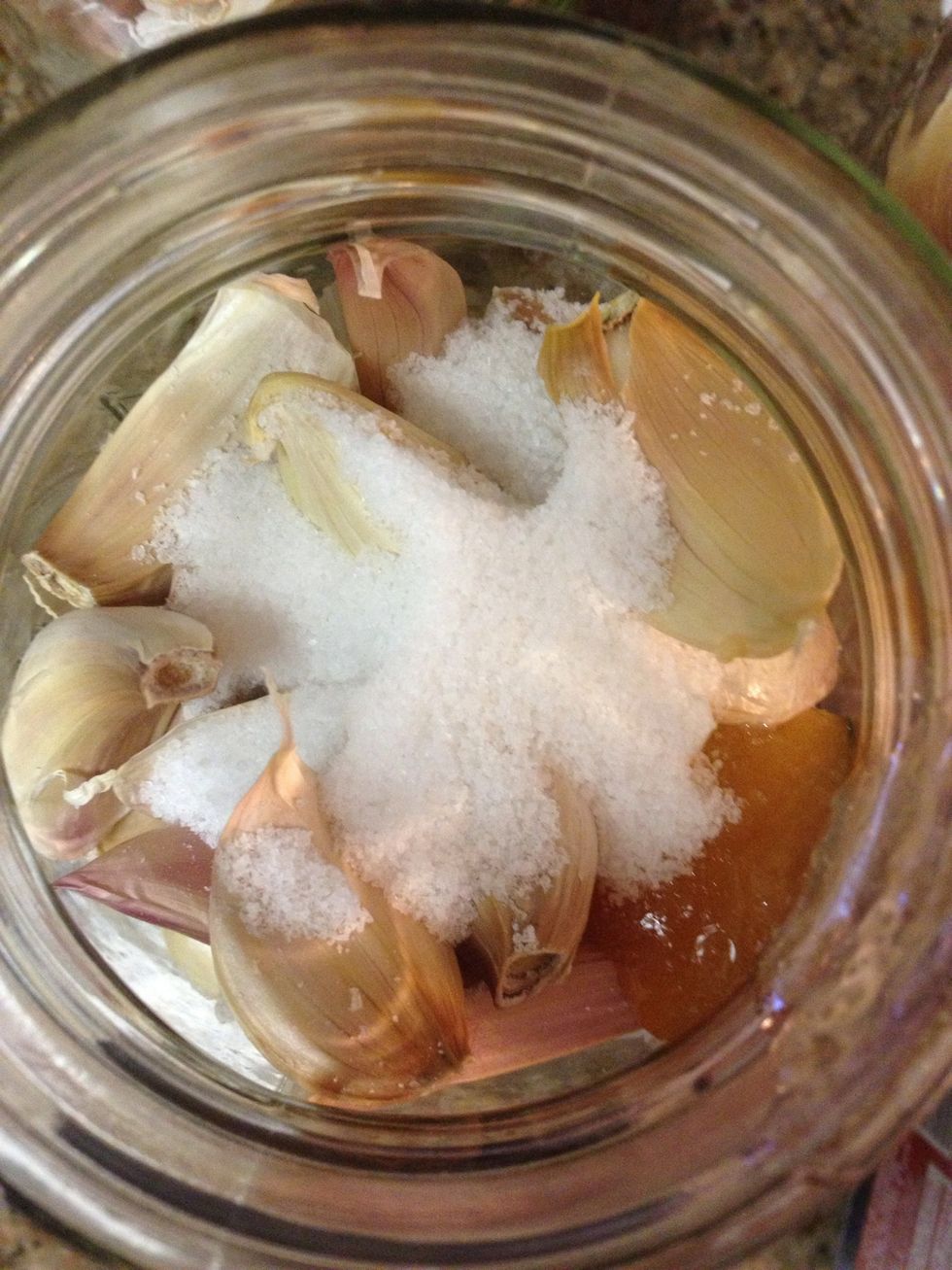 Add 1 tbsp salt 1 tsp honey to each jar
