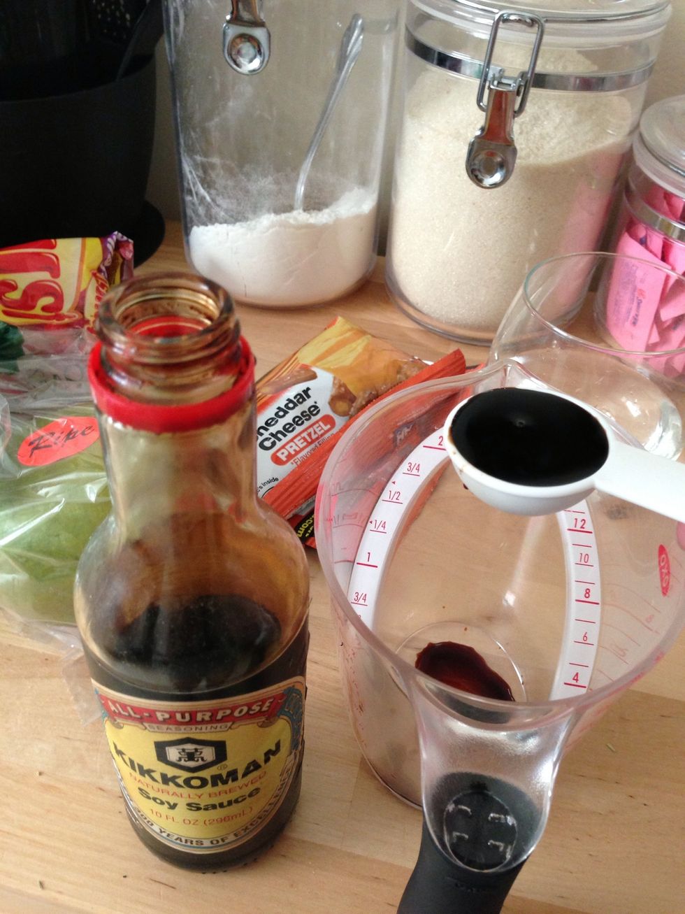 Add 1 tbsp soy sauce to a mixing bowl.