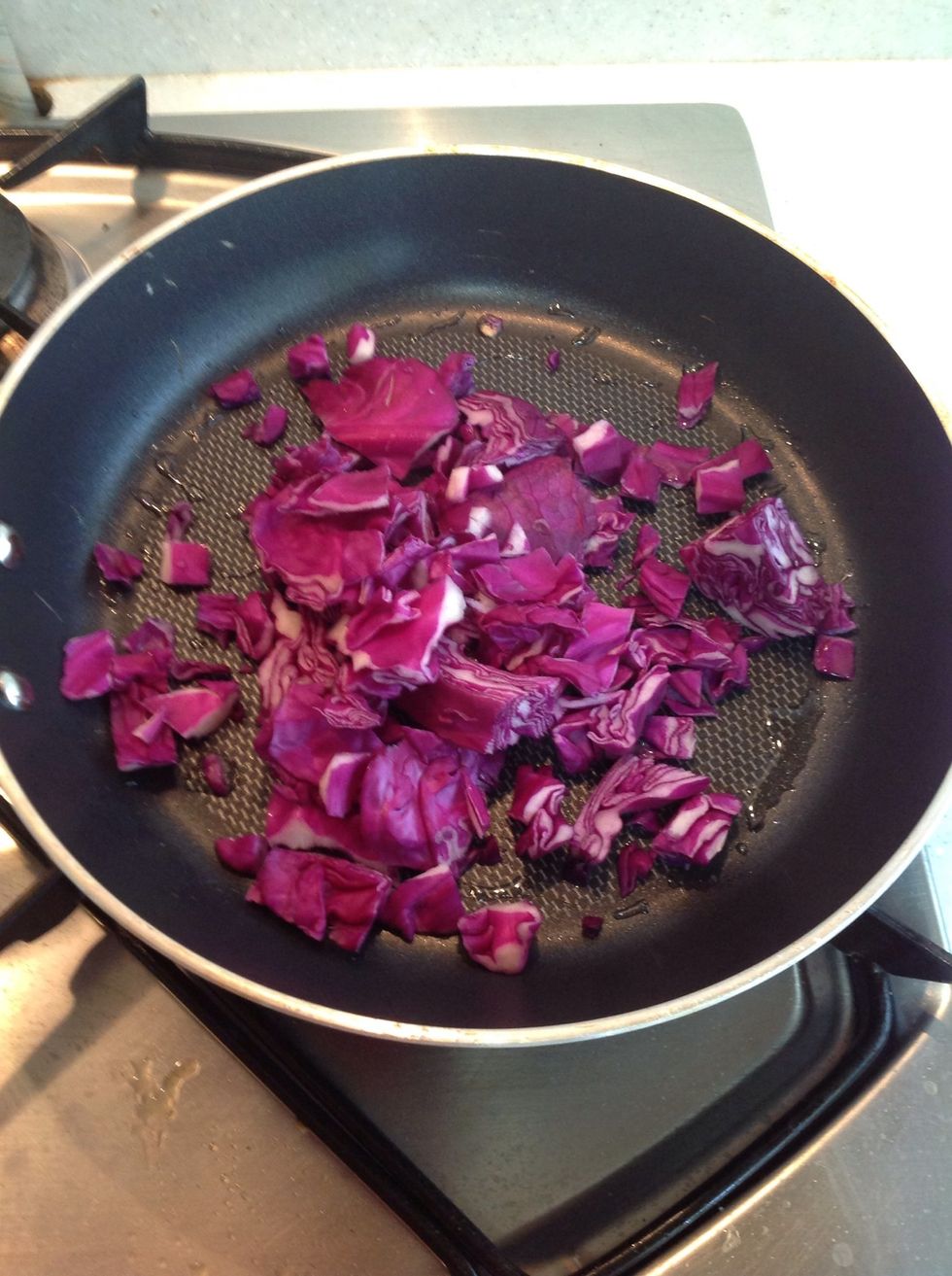 Add 1 teaspoon of olive oil to a pan and saut\u00e9 the cabbage until soft.