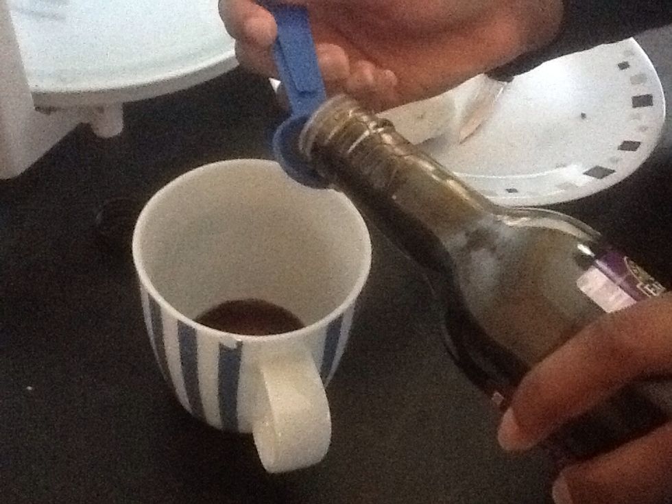 Add 1 teaspoon of soy sauce in a cup.