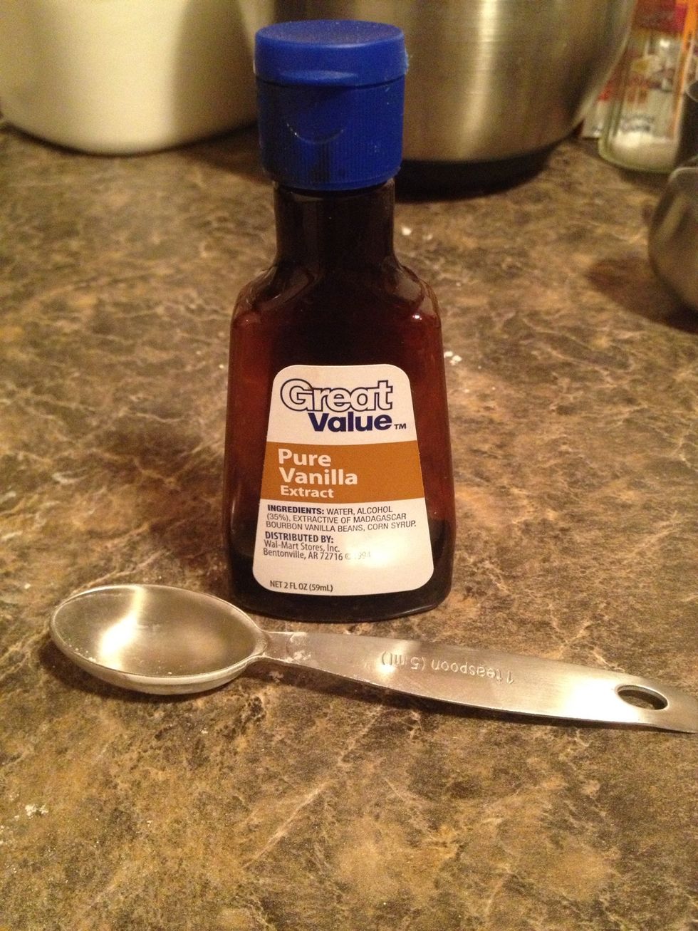 Add 1 teaspoon of vanilla extract to the mixing bowl. You can also use the clear imitation vanilla to keep your cake white. I like to use the pure one though.