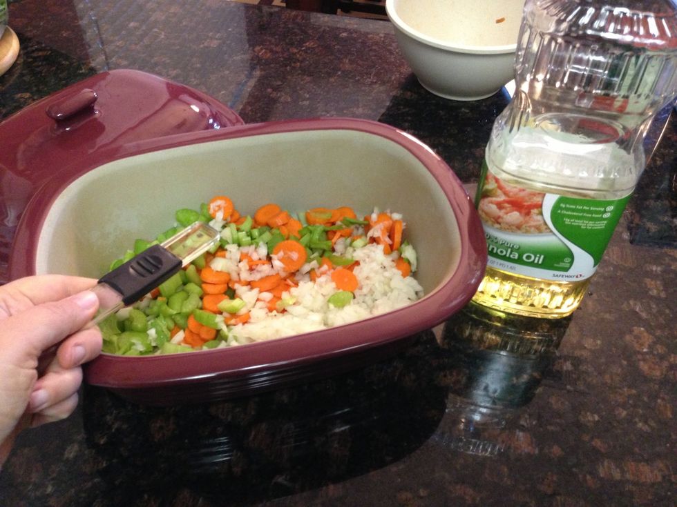 Add 1 tsp cooking oil to veggies. Mix with spatula until coated.