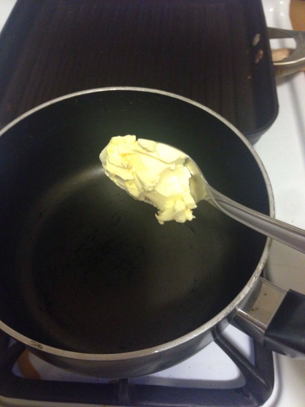 Add 1 tsp of low fat butter to a sauce pot on low heat.