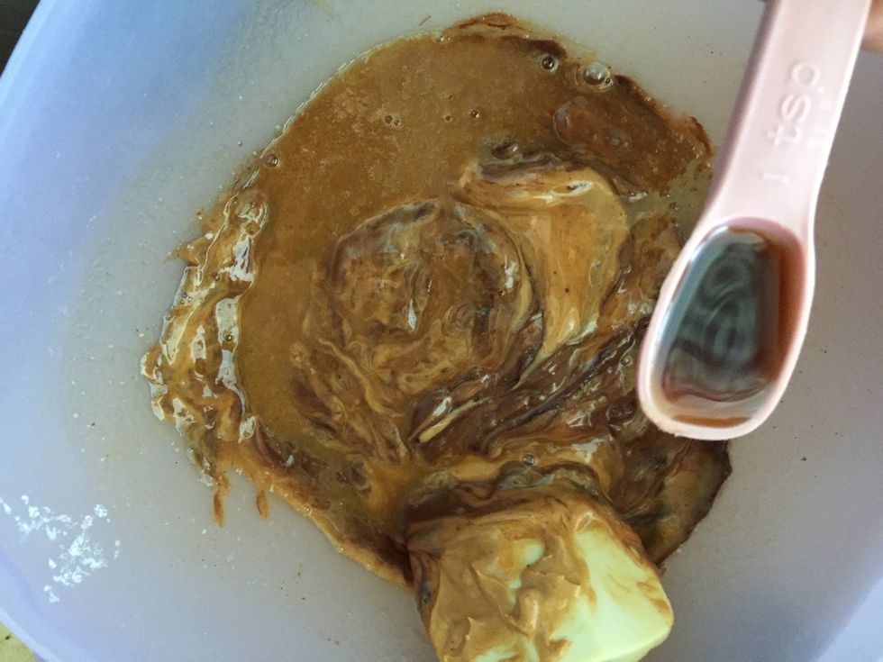Add 1 tsp of vanilla into the peanut butter, chocolate chips, and butter. Stir until everything is mixed