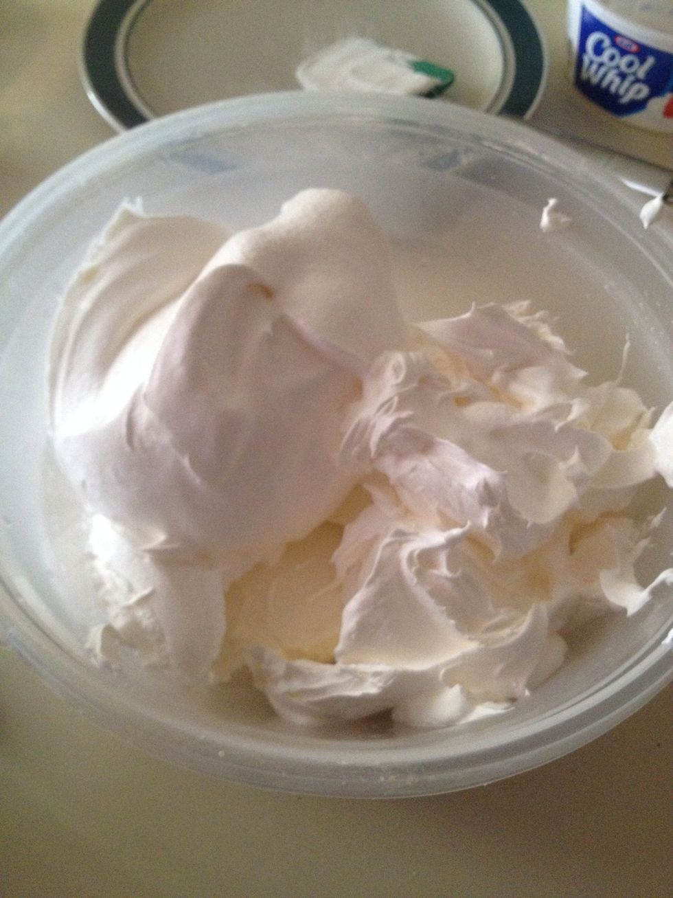 Add 1 tub cool whip, softened cream cheese and 1 cup sugar to a bowl.