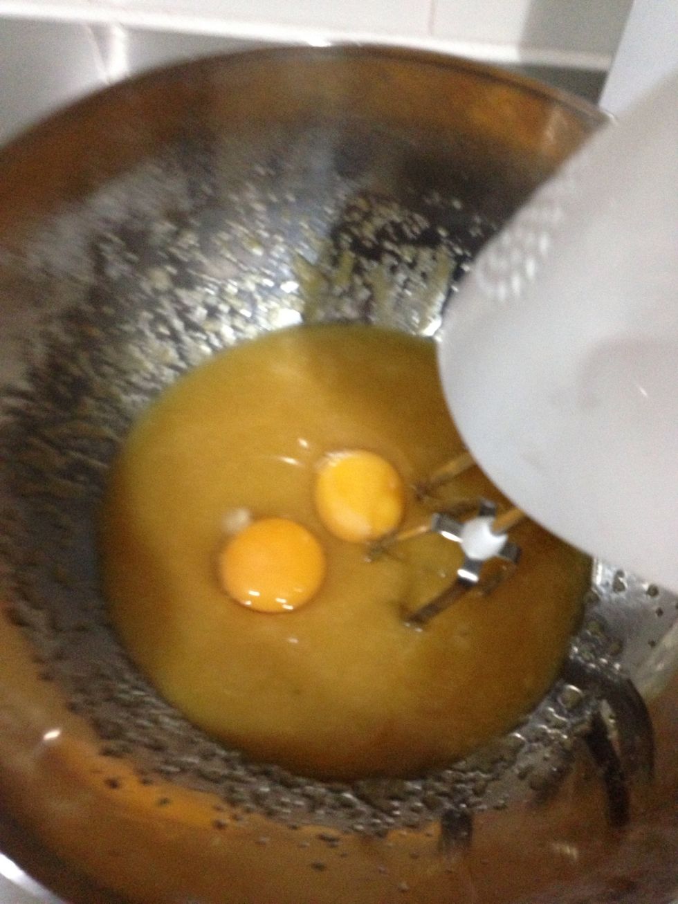 Add 1 whole egg and 1 egg yolk and continue mixing...