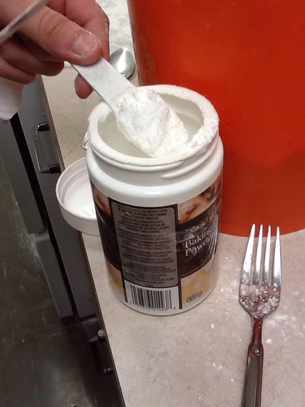 Add 10 mL of baking powder sift in same large bowl as flour