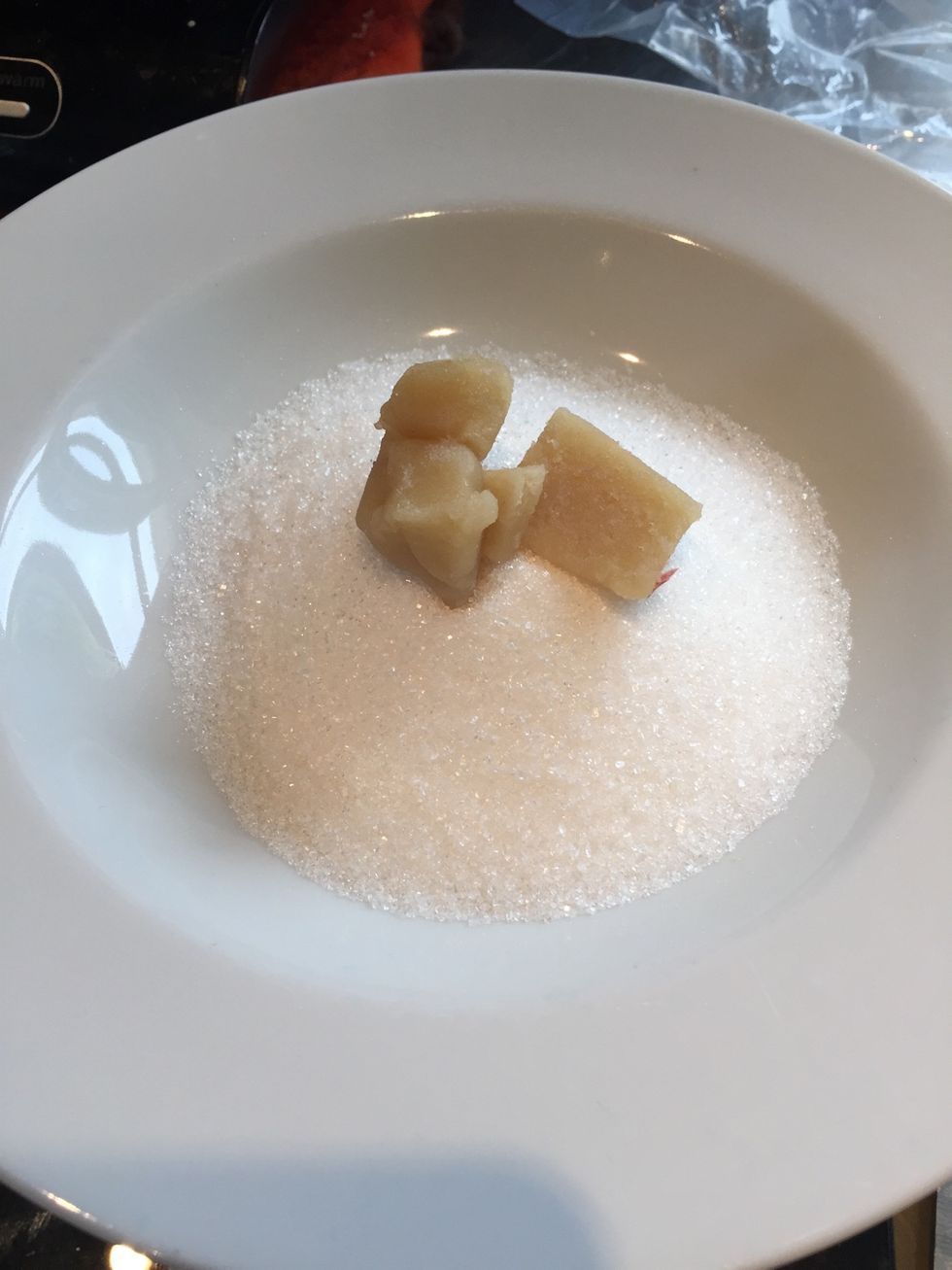 Add 100g of sugar and 50g (just a piece) of marzipan (can be left out), to the rhubarbs