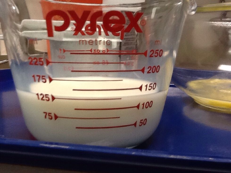 Add 125 mL of milk into same bowl of beaten egg