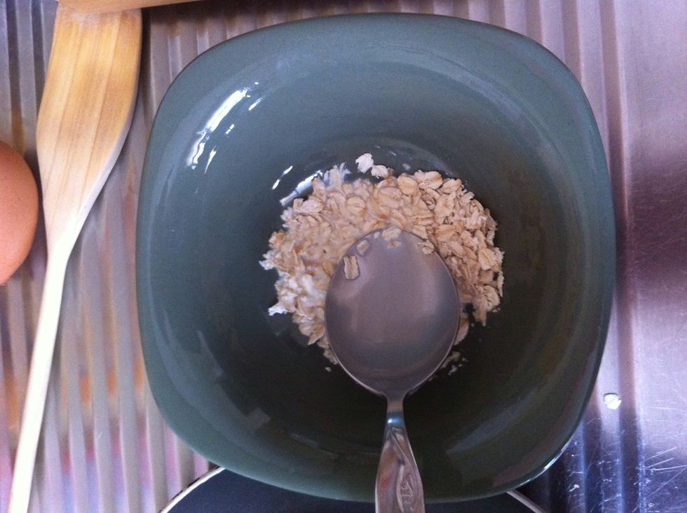 Add 1,5 tbsp milk on it. And grind it with your spoon until its soft.